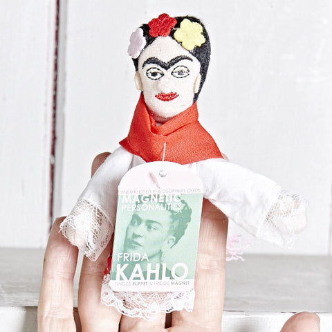 Frida Kahlo Finger Puppet on a finger